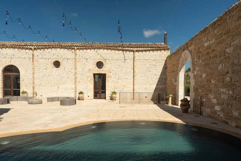 Nature and relaxation by the pool at Baglio Passofondo Estates - An Overview of the Experience at Baglio Passofondo Estates