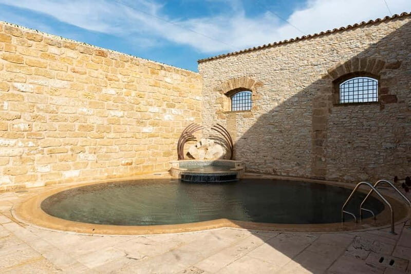 Nature and relaxation by the pool at Baglio Passofondo Estates - The Value of This Experience