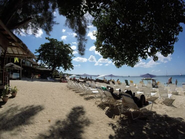 Negril: Beach Visit, Times Square, and Sunset at Rick's Café - Experience Highlights