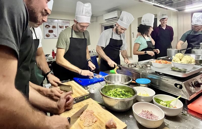Nepali Cooking Class & Momo Making with Pickup In Kathmandu - Three dishes, shared work, and a full meal