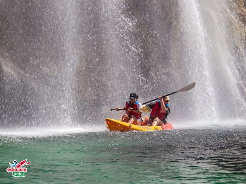 Nerja: Self-Guided Kayak Tour. Maro Waterfall. Support boat for the route. - The Sum Up