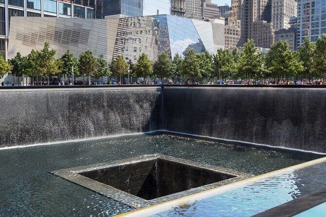 New York Main Attractions Tour with City Bus & Subway! - Charging Bull & Wall Street