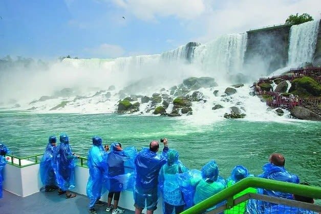 Niagara Falls: Multiple Route Bus, Boat and Walking Tours - Boarding the Maid of the Mist