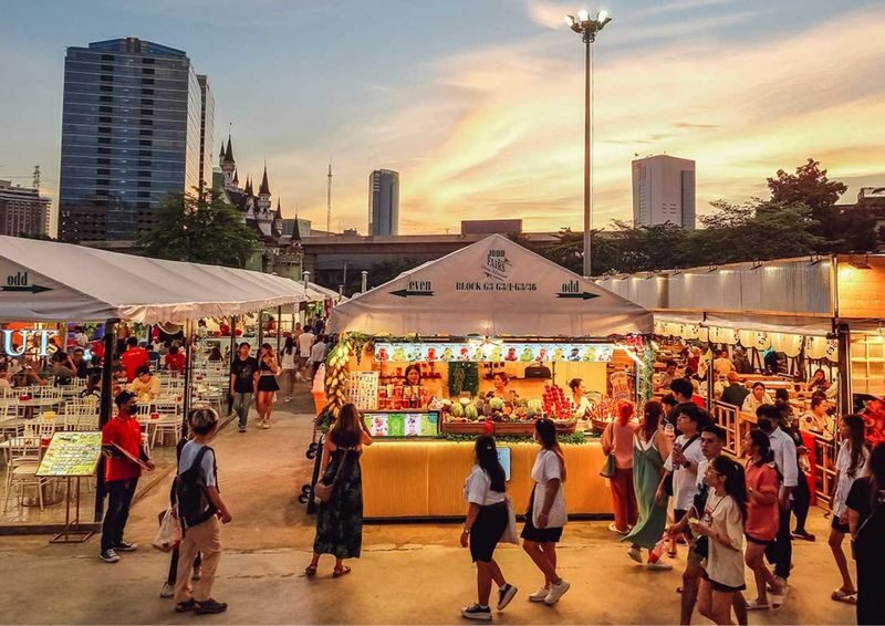 Night life in Bangkok Jodd Fairs Train Night Market - Rain can change the whole evening
