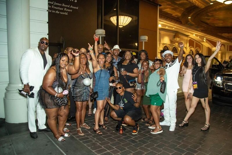 Nightclub party bus experience in Las Vegas - Two bus rides and a photo at the Las Vegas sign
