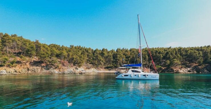 Nikiti: Private Catamaran Day Cruise With Open Bar - Booking and Cancellation