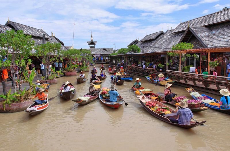 Nong Nooch Tropical Botanical Garden & Pattaya Floating Market Full-Day Private Tour - A guide adds context at the temple