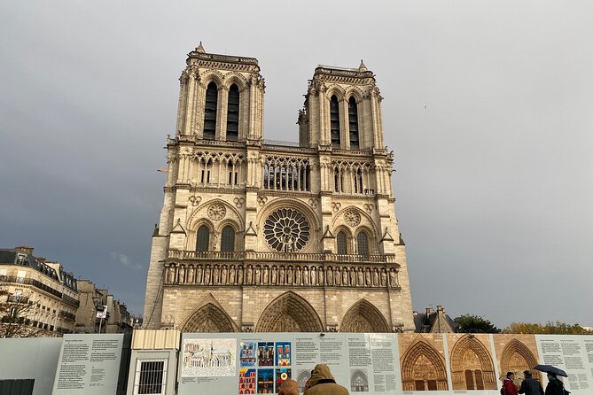 Notre Dame Outdoor Walking Tour With Crypt Entry - Meeting Point and Guide Information