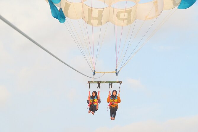 Nusa Dua Marine Parasailing Adventure and Banana Boat With Hotel Pick up - Restrictions and Recommendations