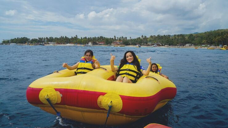 Nusa Penida: Banana Boat in The Ocean Experience - Enchanting Nusa Penida Adventures