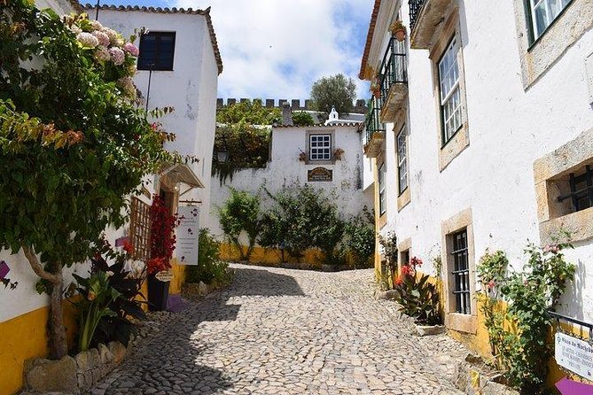 Óbidos, Peniche and Buddha Eden Full Day Private Tour From Lisbon - Tour Duration and Pick-up Location