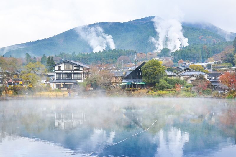 Oita: Yufuin & Kyushu Natural Animal Park & Umi Jigoku & Dazaifu & Beppu Ropeway Day Trip (From Fukuoka) - Yufuin streets and a quiet lake