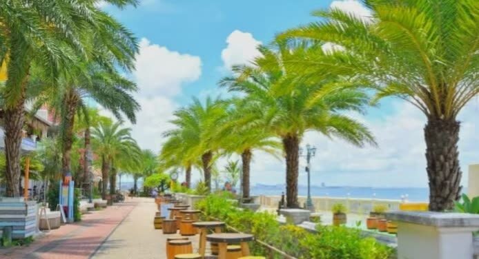 Okinawa day trip private car charter - choose from classic routes & pick-up/drop-off from north/central/south/cruise port/airport/hotel + customizable itinerary - Kouri Island: bridge views and heart-shaped rocks
