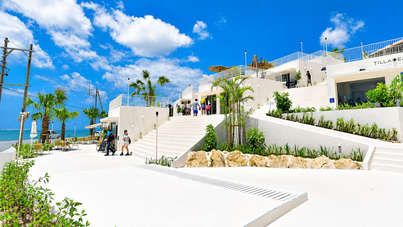 Okinawa One-Day Tour: Northern Secrets / Southern Charm / Central Shopping (Multiple Routes Available) - Kouri Island: turquoise water, a bridge, and shrimp rice