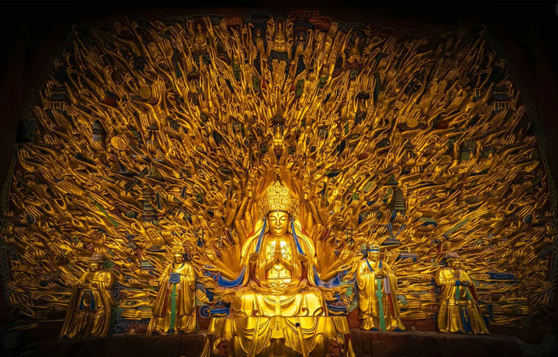 One-Day Tour to Dazu Rock Carvings and Longshui Lake in Chongqing - Beishan: close details and a climb
