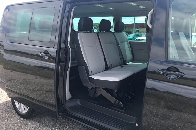 One-Way Transfer by Minivan From Seville Airport to Hotel in Seville Center - Confirmation and Booking Details
