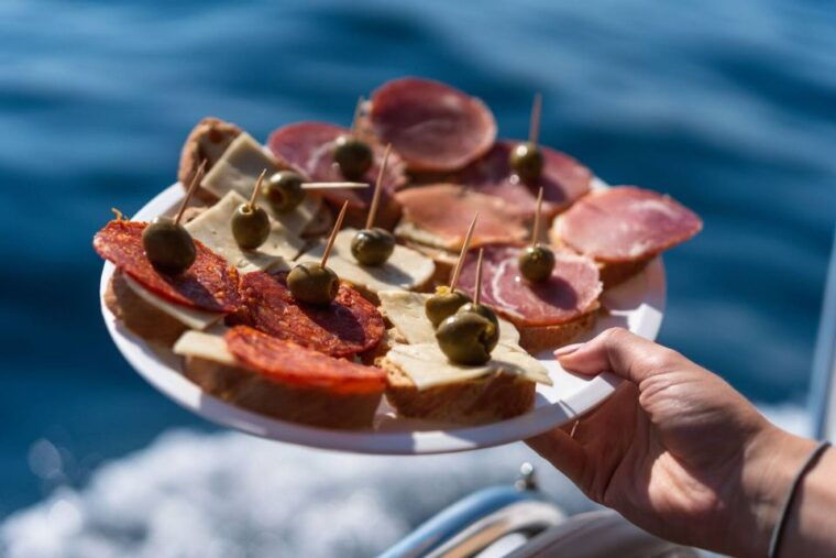 Opatija/Lovran: Boat Trip to Secluded Beaches on Island Cres - Onboard Amenities and Facilities
