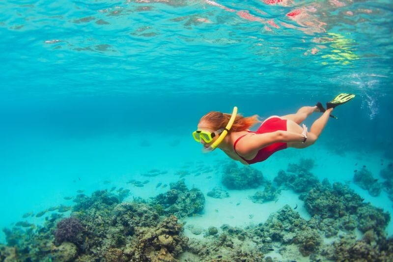Orange Bay Full-Day Snorkeling & Banana Boat Experience - Two reef stops put the Red Sea at the center