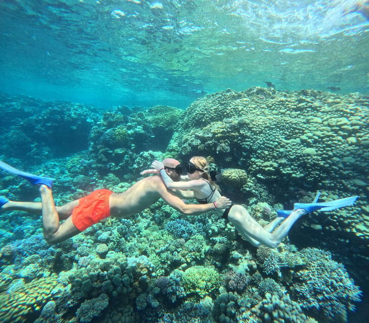 Orange Bay Full-Day Snorkeling & Banana Boat Experience - Lunch, drinks, and the included water ride
