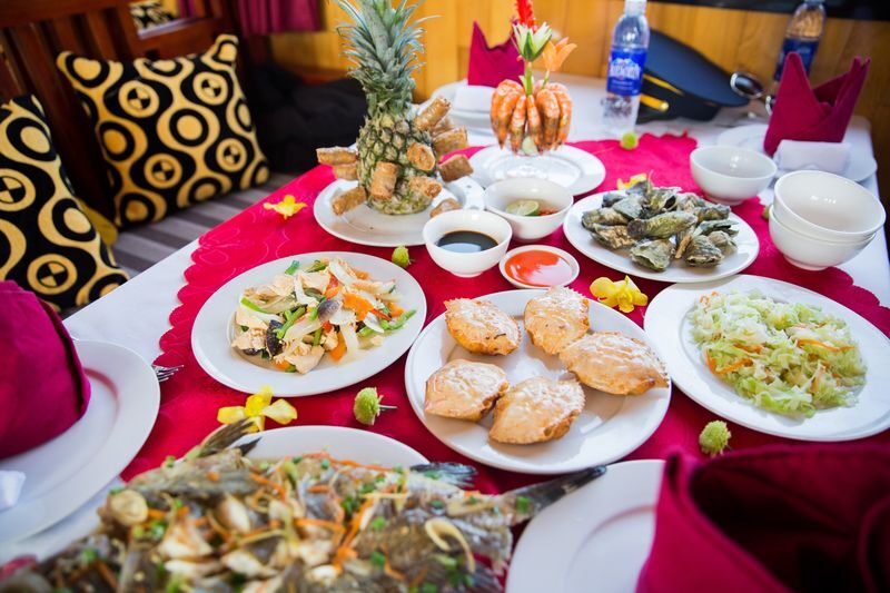 Oriental Sails 2D1N Cruise: Ha Long Bay, Sung Sot, Ti Top - Sunset, spring rolls, and a lively or quiet evening