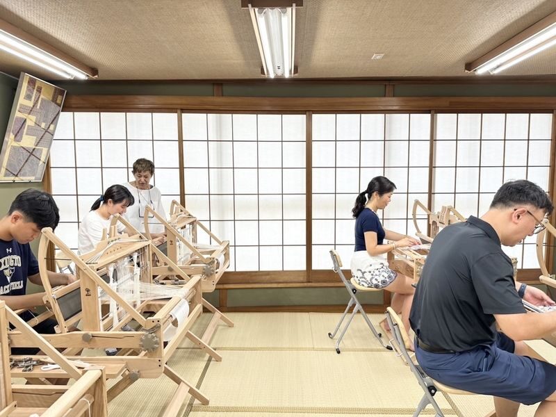 Orinami Asakusa: Japanese Lucky Charm Making Experience in Asakusa - Working the loom, one thread at a time