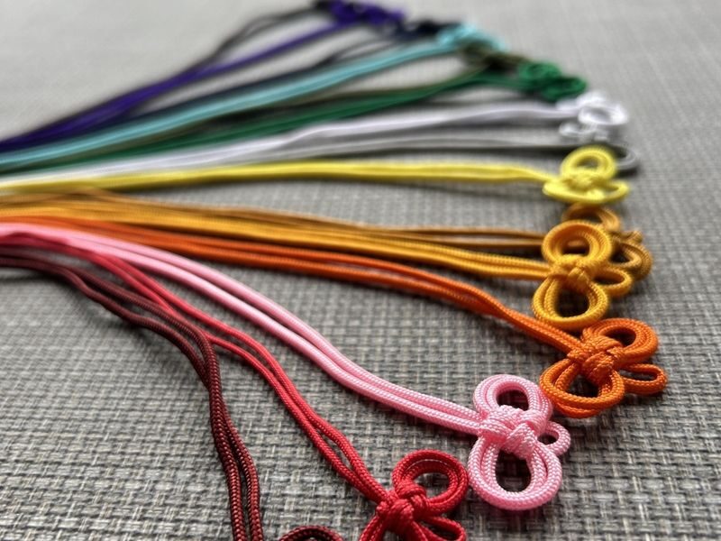 Orinami Asakusa: Japanese Lucky Charm Making Experience in Asakusa - Friendly instruction, with language details to check