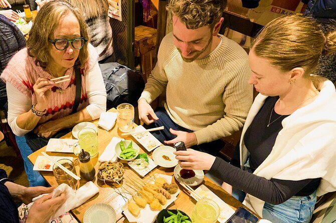 Osaka: Guided Food Tour with 12 Dishes at 4 Local Eateries - The Sum Up