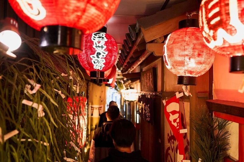 Osaka Walking Tour with Dotonbori River Cruise - Hozenji brings the volume down
