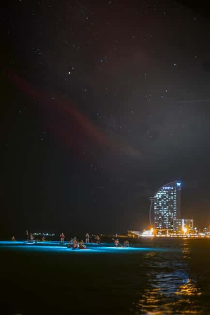 Paddle surf at night with light & drink -photos &videos - The Sum Up