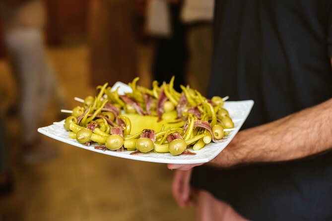 Paella and Tapas Cooking Class in Madrid With Market Visit - Cancellation Policy and Traveler Reviews