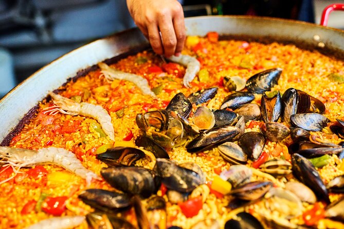 Paella Barcelona: Market Visit, Tapas, Sangria and Paella Class - Learning to Make Paella