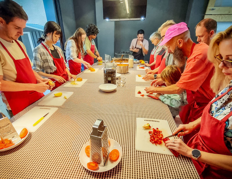 Paella Cooking Class with Tapas & Drinks in Barcelona - Three dishes, one Barcelona table