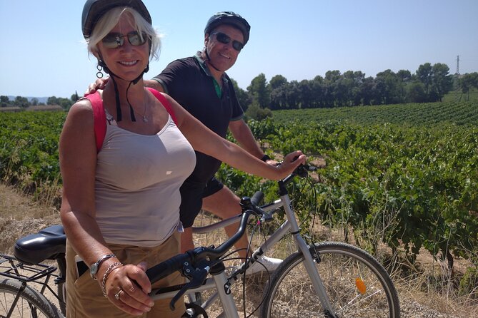Paella Master-Class, Winery Visit and Bike Ride With Hotel Pickup From Sitges - Itinerary Overview