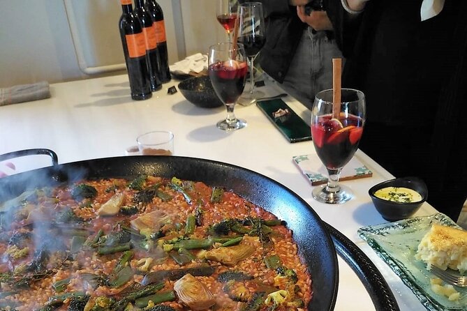 Paella Showcooking With Rooftop Views in Seville City - Overview and Menu