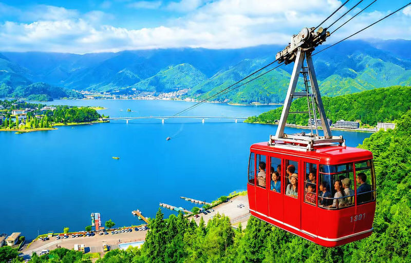 Panoramic Mt. Fuji Tour - Kachikachi Ropeway, Matcha Experience, Oshino Hakkai and Oishi Park Day Trip (Departure from Tokyo/Shinjuku) - Mount Fuji from the ropeway, lake, and village