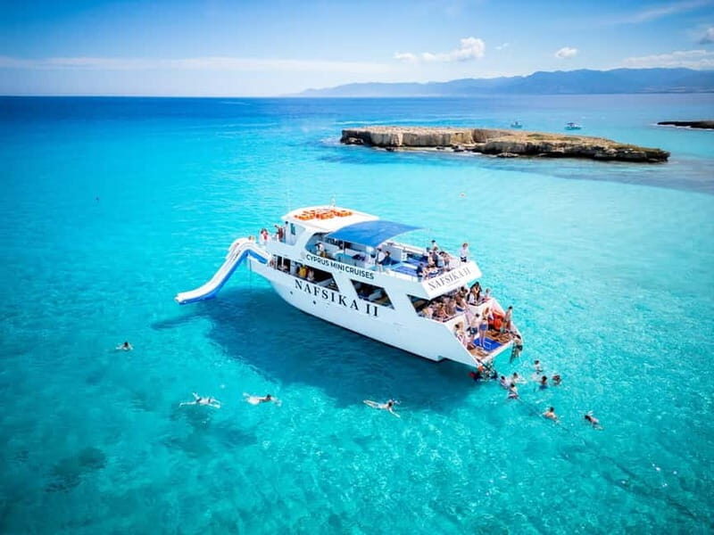 Paphos: Blue Lagoon Boat Trip with Transfers - The Onboard Experience: Food, Drink, and Atmosphere