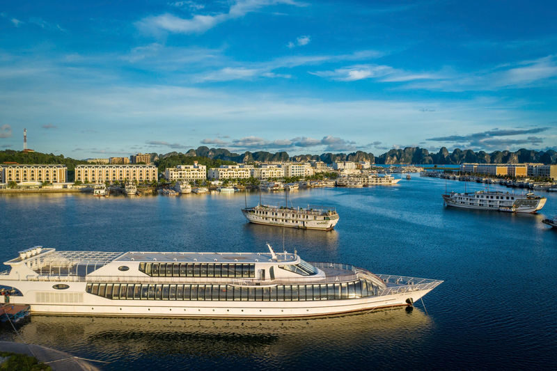 Paradise Delight Day Cruise: Ha Long Bay, Sung Sot, Ti Top - A big yacht, with the bay as its backdrop