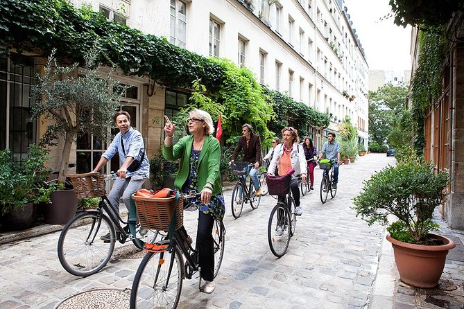 Paris 3-Hour Bike Tour and Market Food Tasting - Iconic Squares and Landmarks