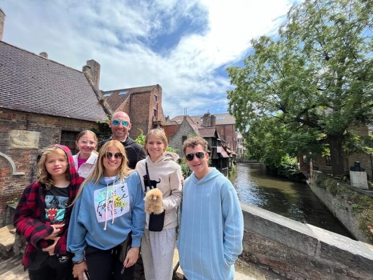 Paris: Bruges and Ghent Day Trip With Boat Ride and Tastings - Exploring Bruges: A Medieval Gem