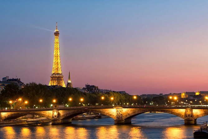 Paris by Night With Seine River Cruise and Roundtrip Luxury Transportation - Landmarks and Commentary