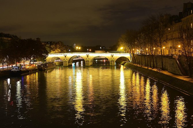 Paris by Night With Seine River Cruise and Roundtrip Luxury Transportation - Seine River Cruise Experience