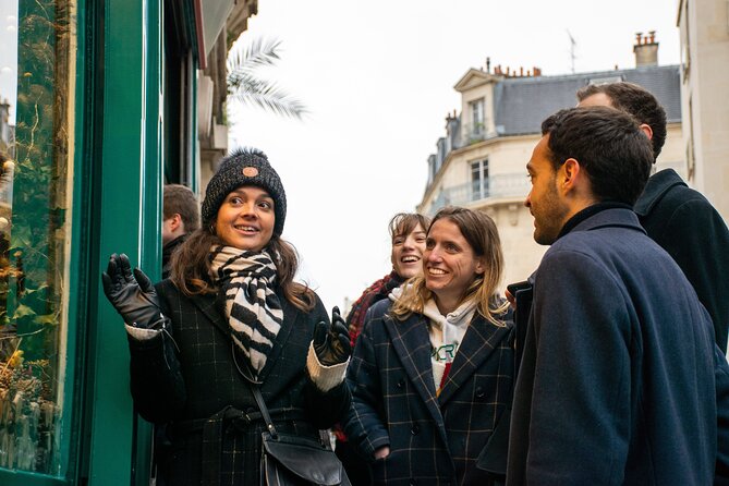 Paris Christmas Lights Walking Tour With Local Guide - Pricing and Guarantee