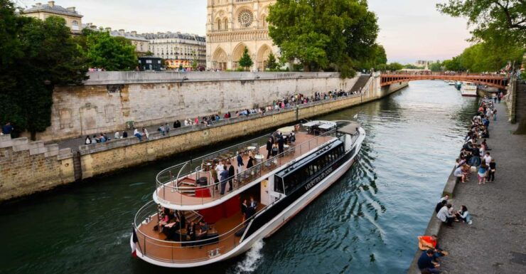 Paris: Evening Cruise With Drink and City Walking Tour - Experience Highlights