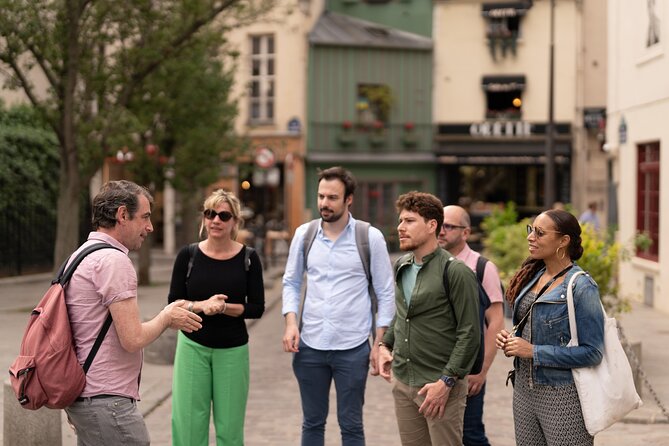 Paris Iconic Neighborhoods Guided Walking Tour - Pricing and Booking