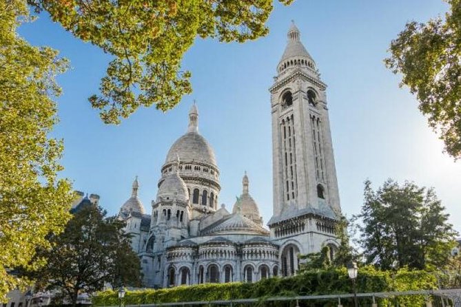 Paris Montmartre Private Walking Tour With Sacre Coeur - Montmartre: A Bohemian Parisian Gem