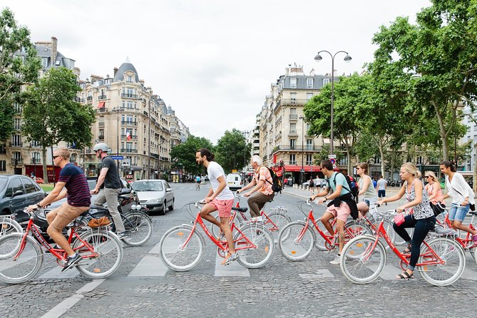 Paris Sightseeing Guided Bike Tour Like a Parisian With a Local Guide - Tour Overview and Attractions