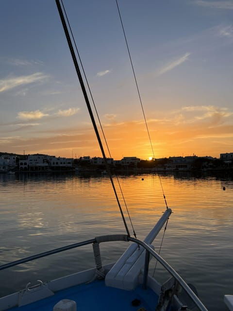 Paros: Parikia Bay Sunset Boat Tour With Snorkeling - Booking Process