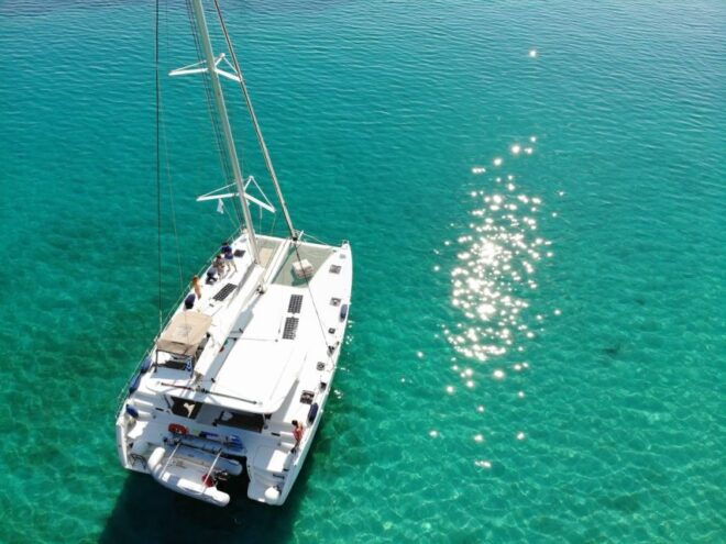 Paros: Private Catamaran Cruise With Meal, Drinks & SUP - Experience Snorkeling in the Aegean Sea