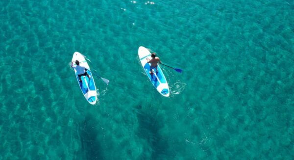 Paros: Private Catamaran Cruise With Meal, Drinks & SUP - Relax and Take in the Stunning Coastal Views