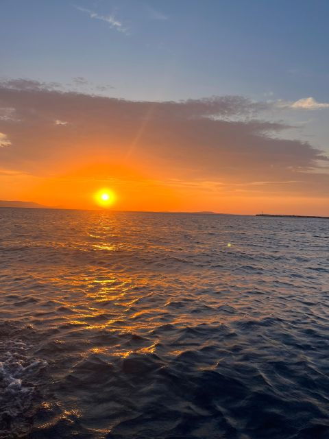 Paros: Sunset Boat Tour to Antiparos With Wine - Experience